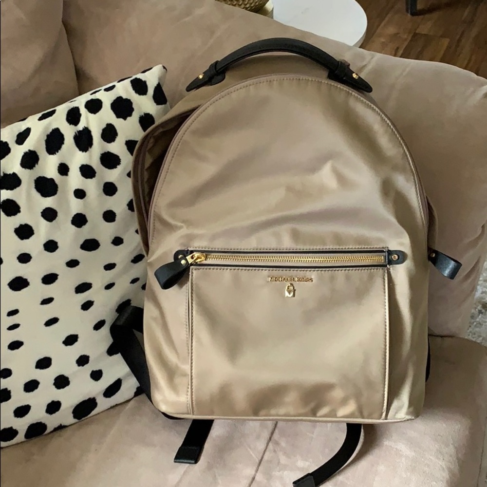 Michael Kors backpack. Black and gold hardware
